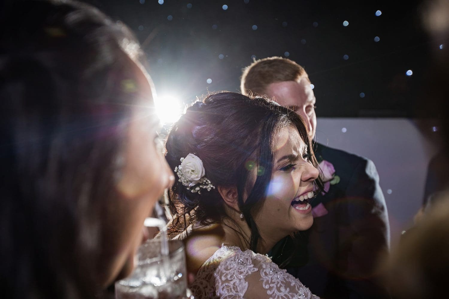 happy tears from a bride dancing at her wedding in suffolk. Milsoms Kesgrave Hall wedding