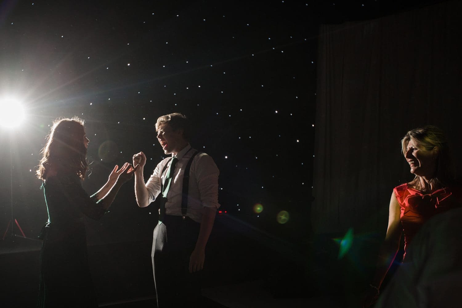 young couple have fun on the dancefloor at a suffolk wedding 