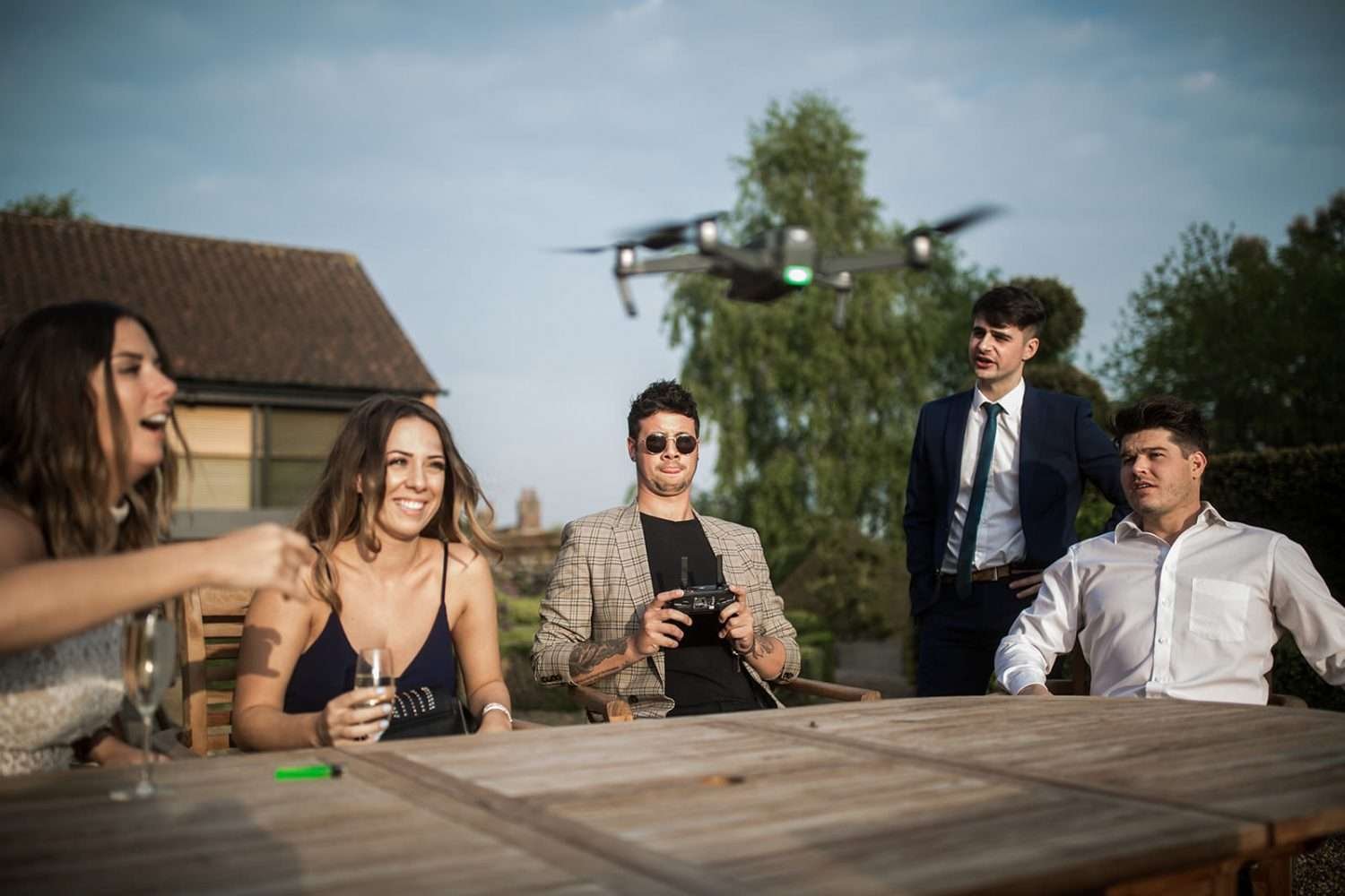 a guest impresses his peers at a wedding with his drone flying skills