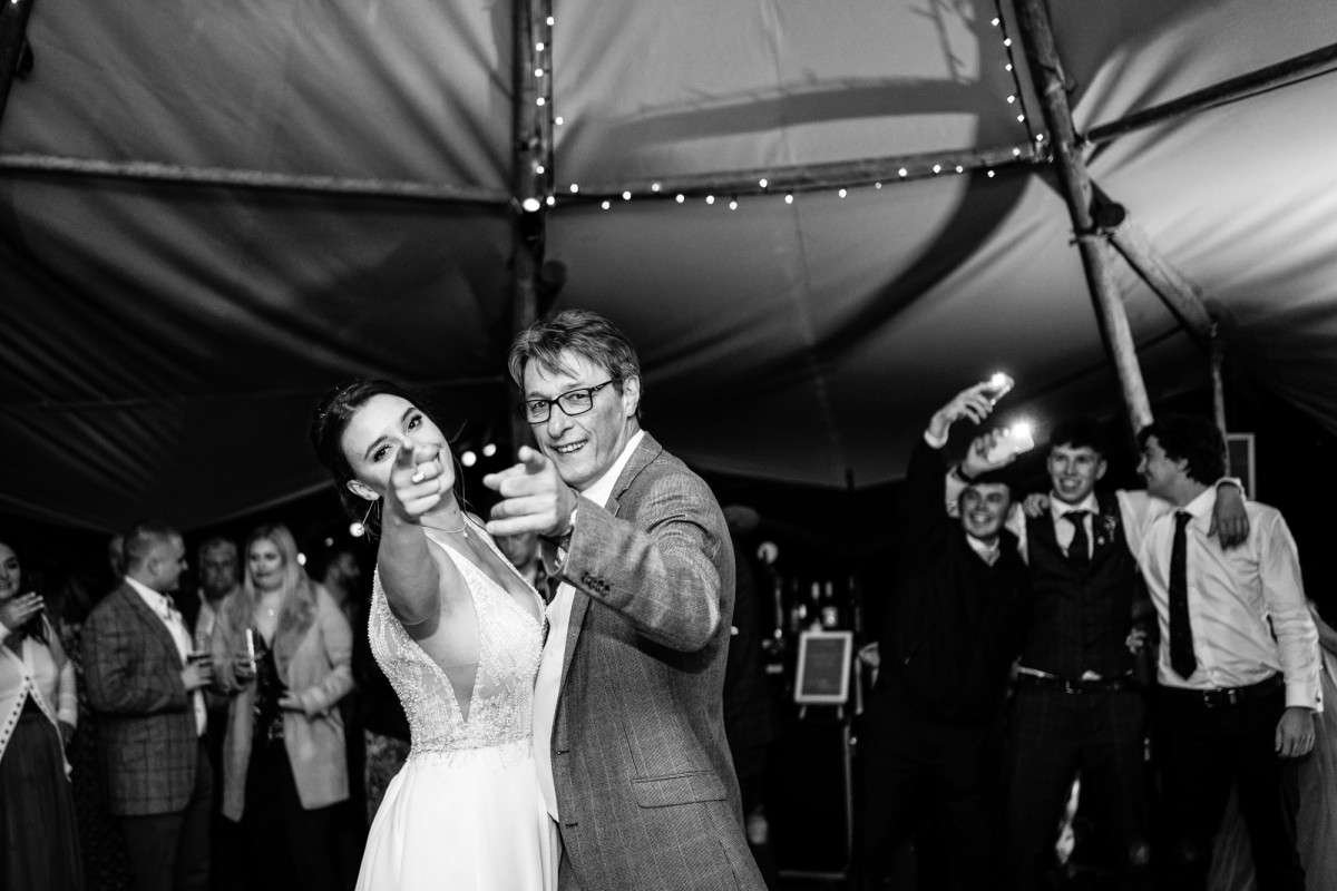 Suffolk wedding bride and her dad dancing 
