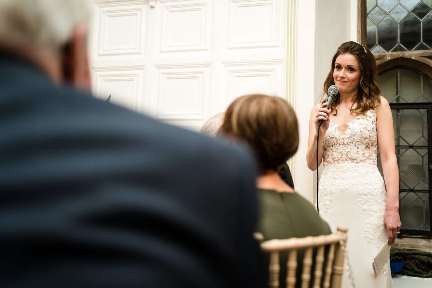 bride gives speech after dinner at her wedding breakfast
