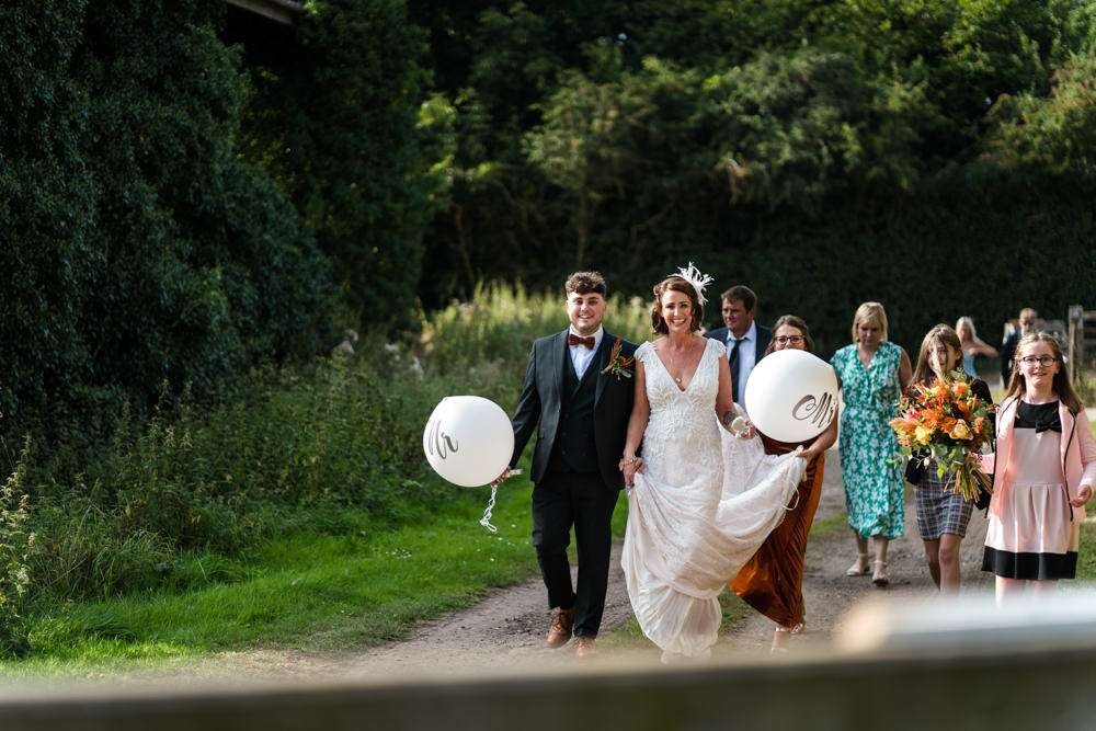 A Fishley Hall wedding scene, The happy couple and all their family and guests parade from the church to fishley hall for the wedding reception.