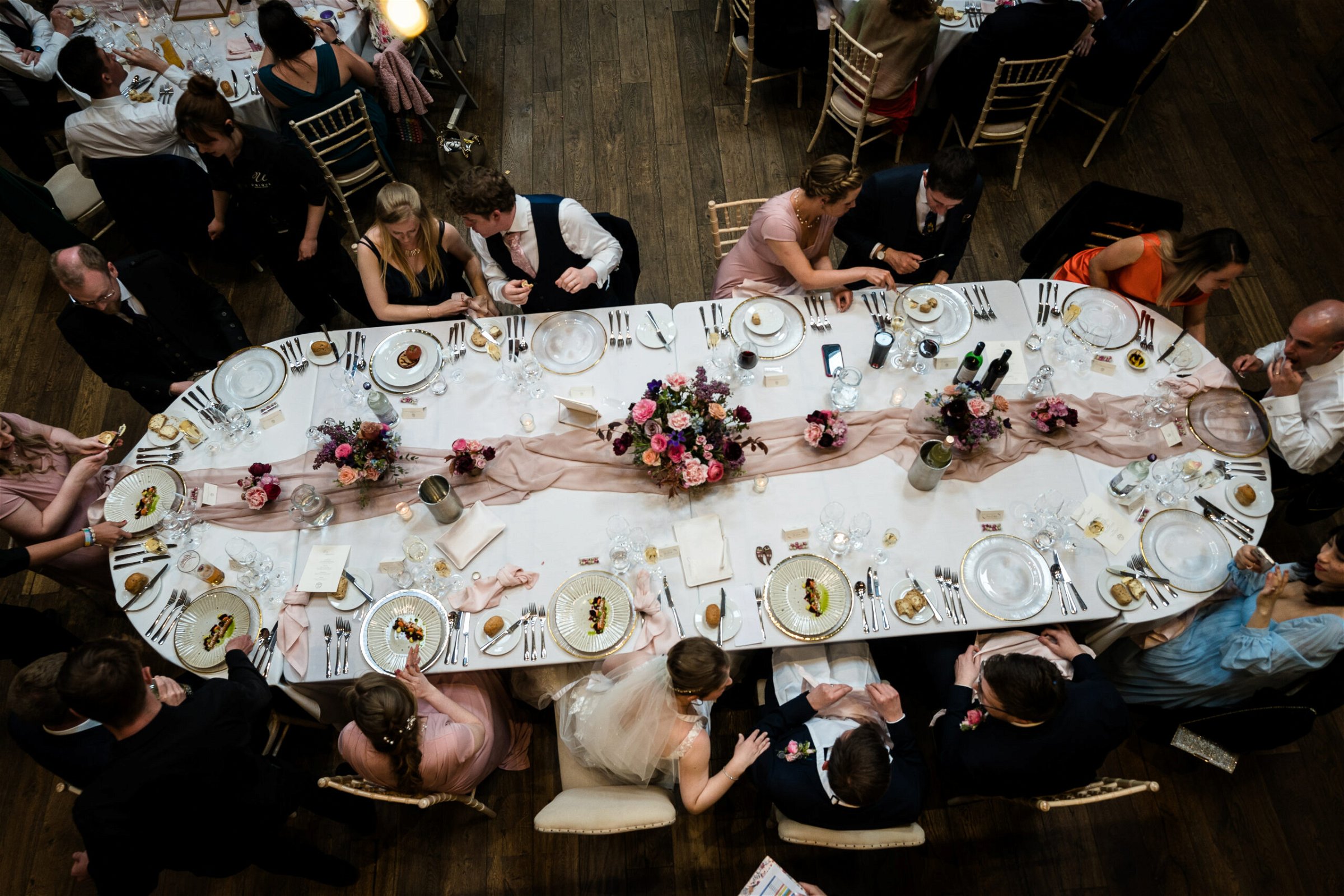 a birds eye view of a wedding breakfast table at a norfolk wedding