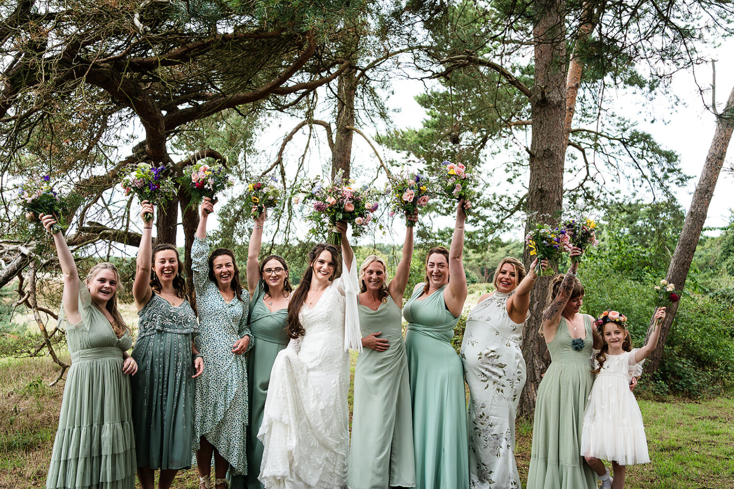 bride and her bridesmaids all ready for the ceremony in good time having had a relaxed morning getting ready at happy valley in norfolk