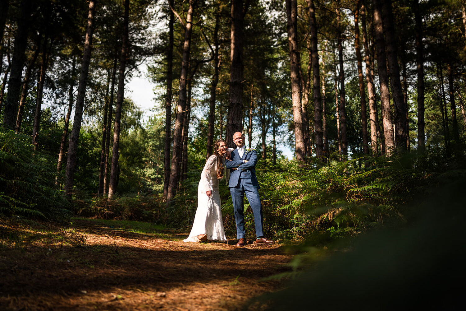 a fun wedding portrait of a couple married at happy valley wedding venue on Norfolk by www.lisaandneil.co.uk
